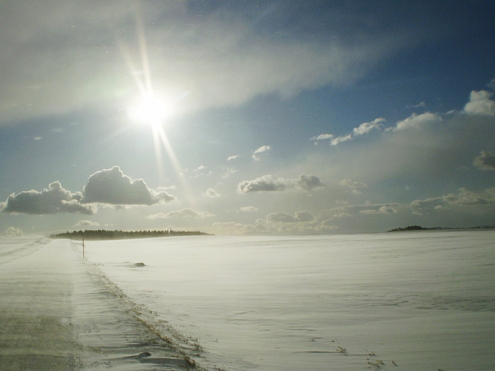 Silný vítr před západem Slunce